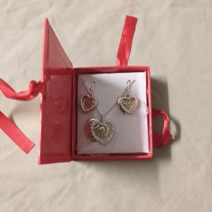 Heart box necklace and earring sets.